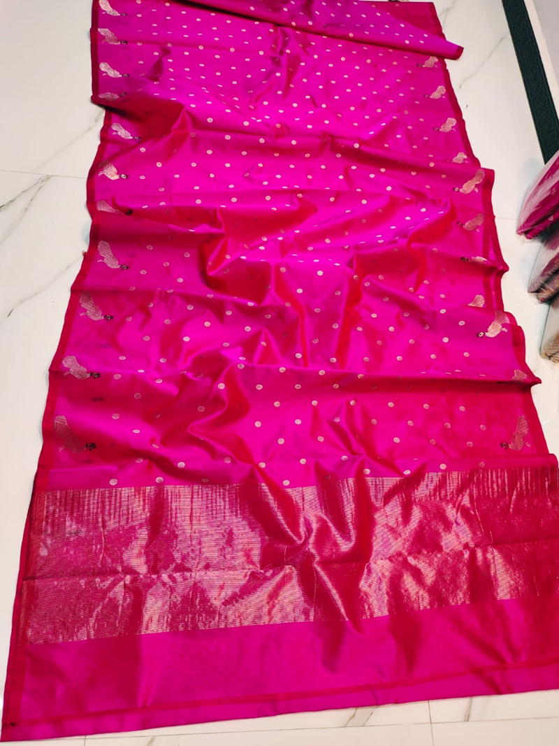 Fuchsia Radiance with Silver Buttah and Peacock Motifs Pattu Silk