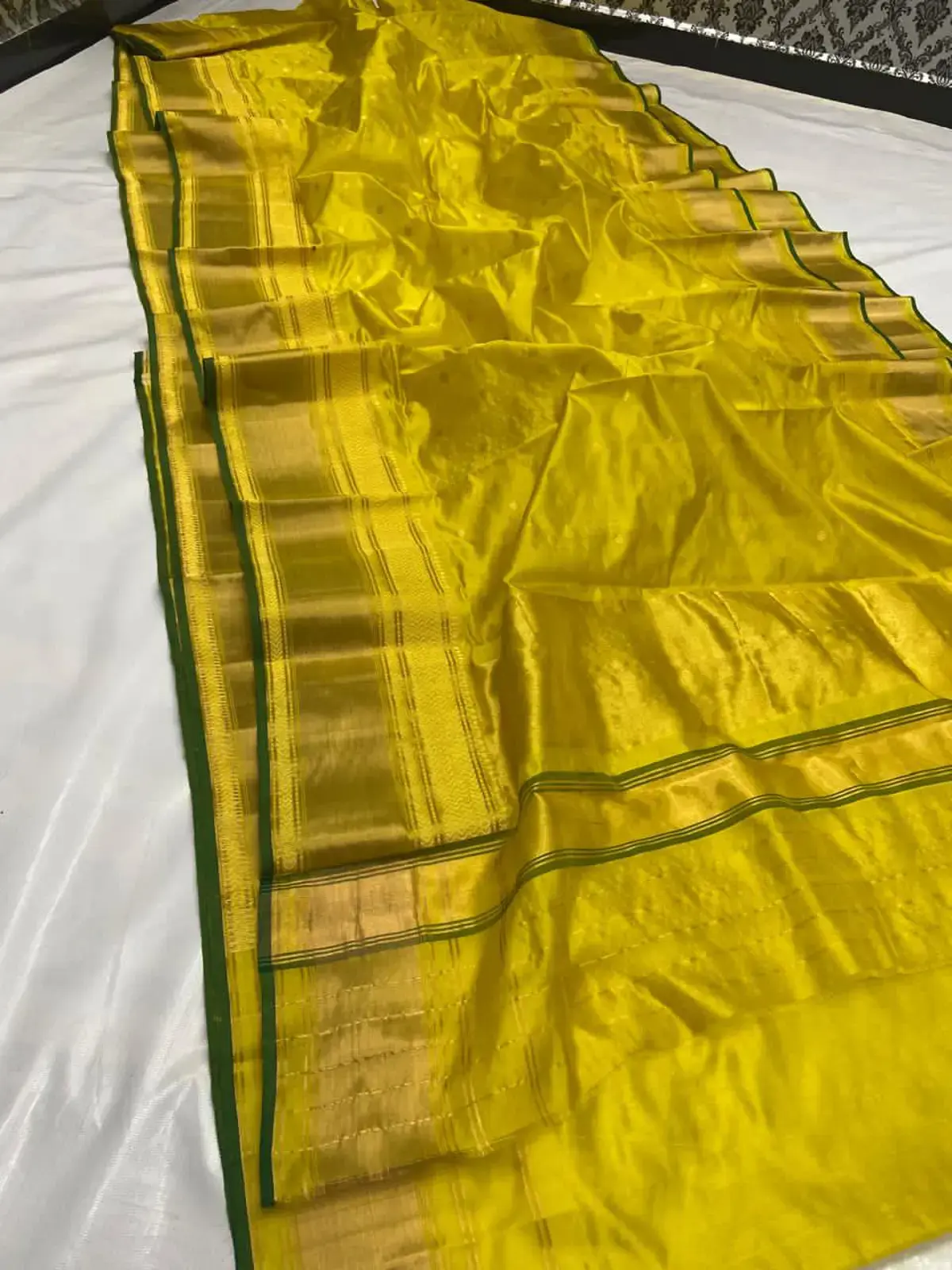 Vibrant Marigold with Subtle Gold Buti Pattu Silk